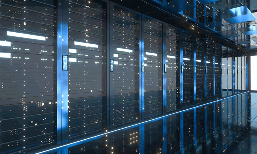 data-center A photo of numerous black computer servers within transparent cupboards in a data center.